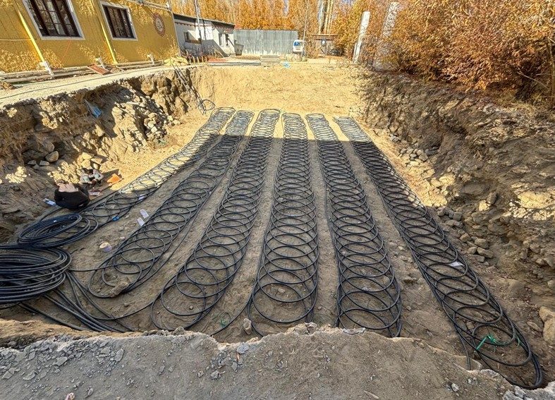 Horizontal Slinky loop geothermal field laid out at the Thiksey site